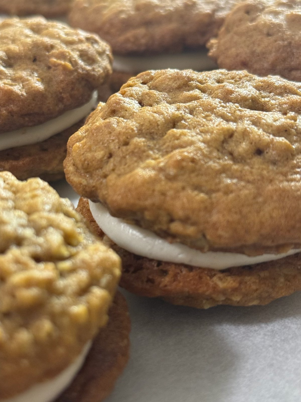 Freshly baked oatmeal pies ready for packaging.